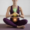 young-woman-meditating-with-chakras-her-body-2